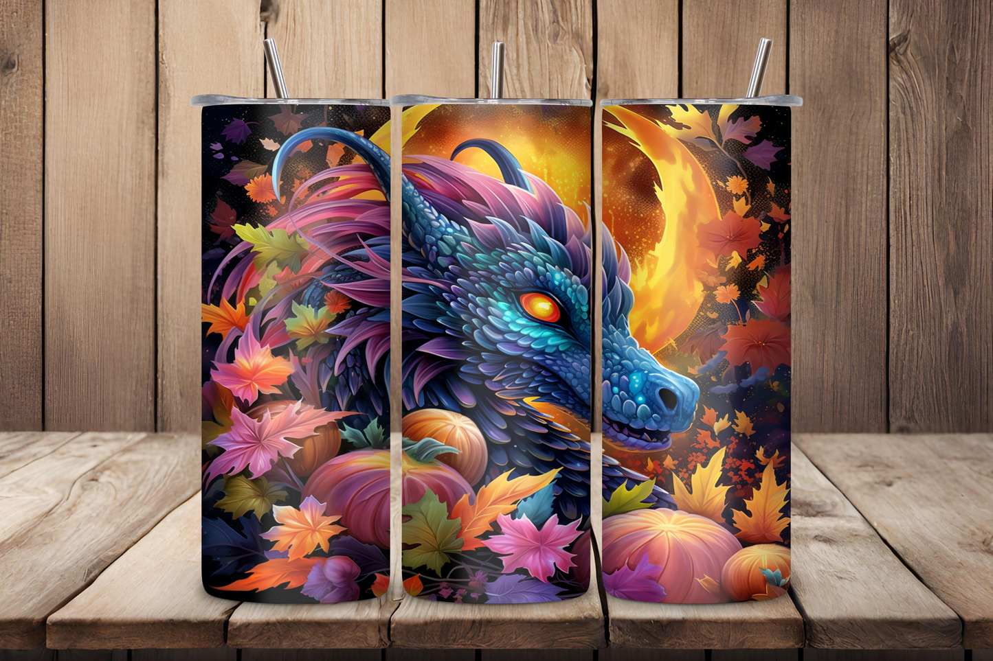 Vibrant Halloween-themed tumbler showcasing an artistic depiction of a blue dragon surrounded by colorful autumn leaves and pumpkins. The tumbler captures the essence of fall with a blend of fiery and floral elements, ideal for seasonal celebrations.