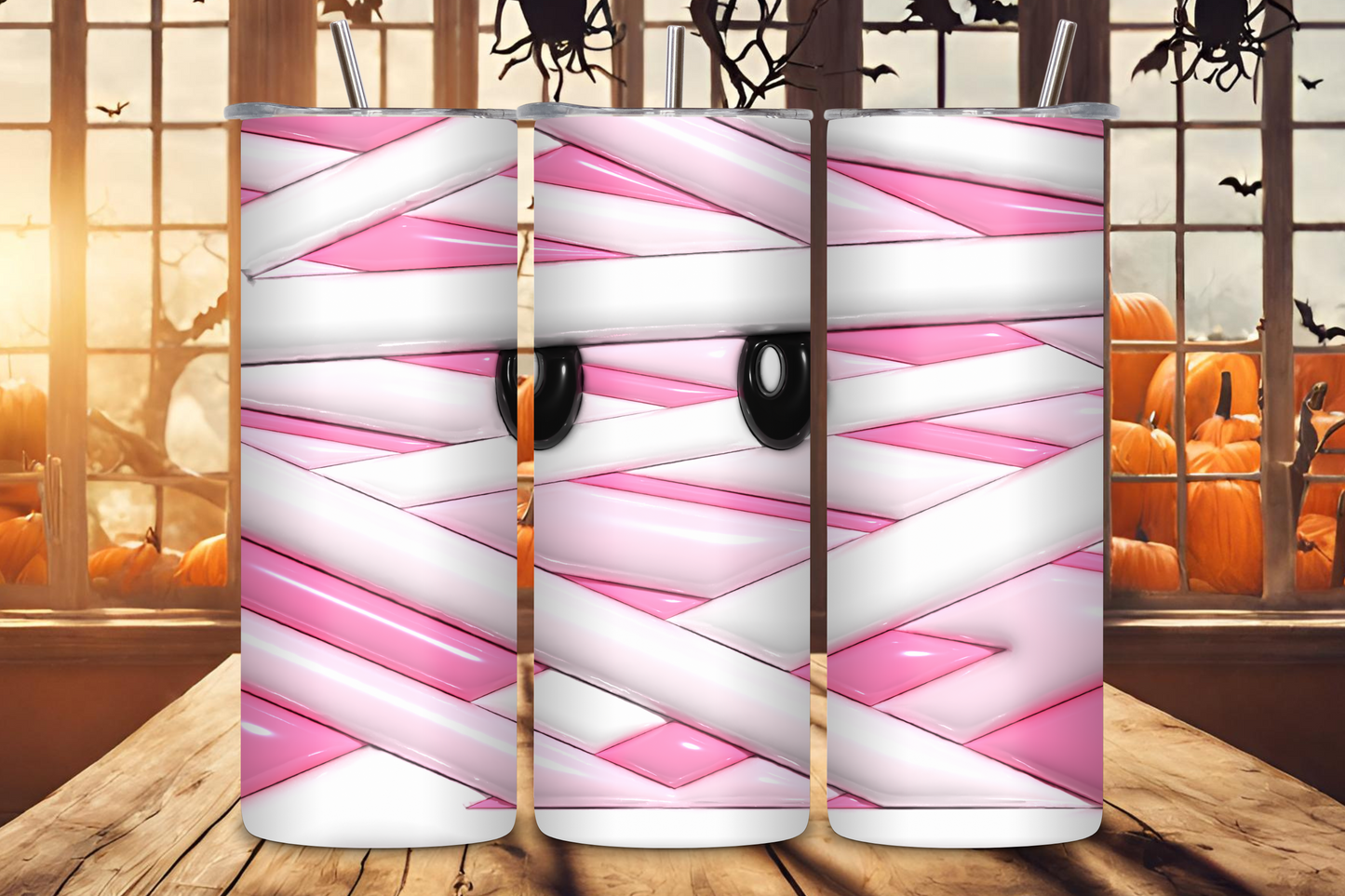 Artistically crafted 'Mummy Wrap' Tumbler with a pink and white mummy-wrap design, adding a thematic and stylish touch to your beverage holding experience