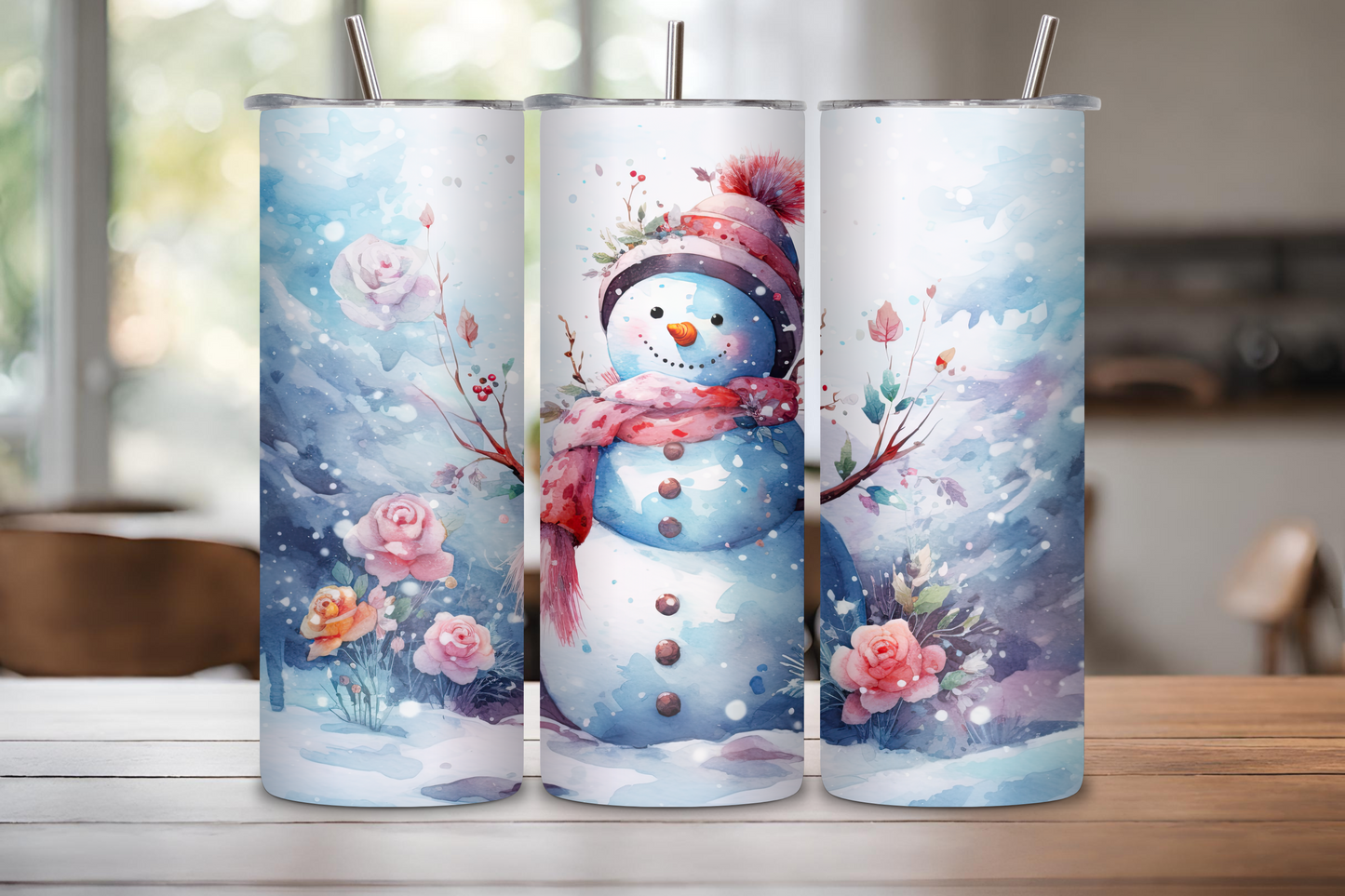 Charming winter-themed tumbler featuring a snowman with a colorful scarf among snowy scenes and pink roses, ideal for holiday beverages