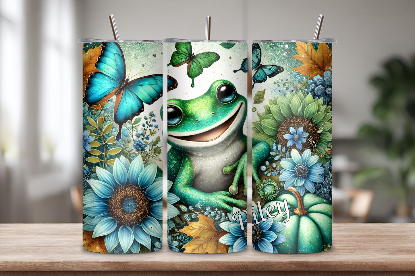 Customizable whimsical frog tumbler featuring a cheerful green frog with blue butterflies, sunflowers, and rustic autumn leaves, personalized with a name up to 12 characters