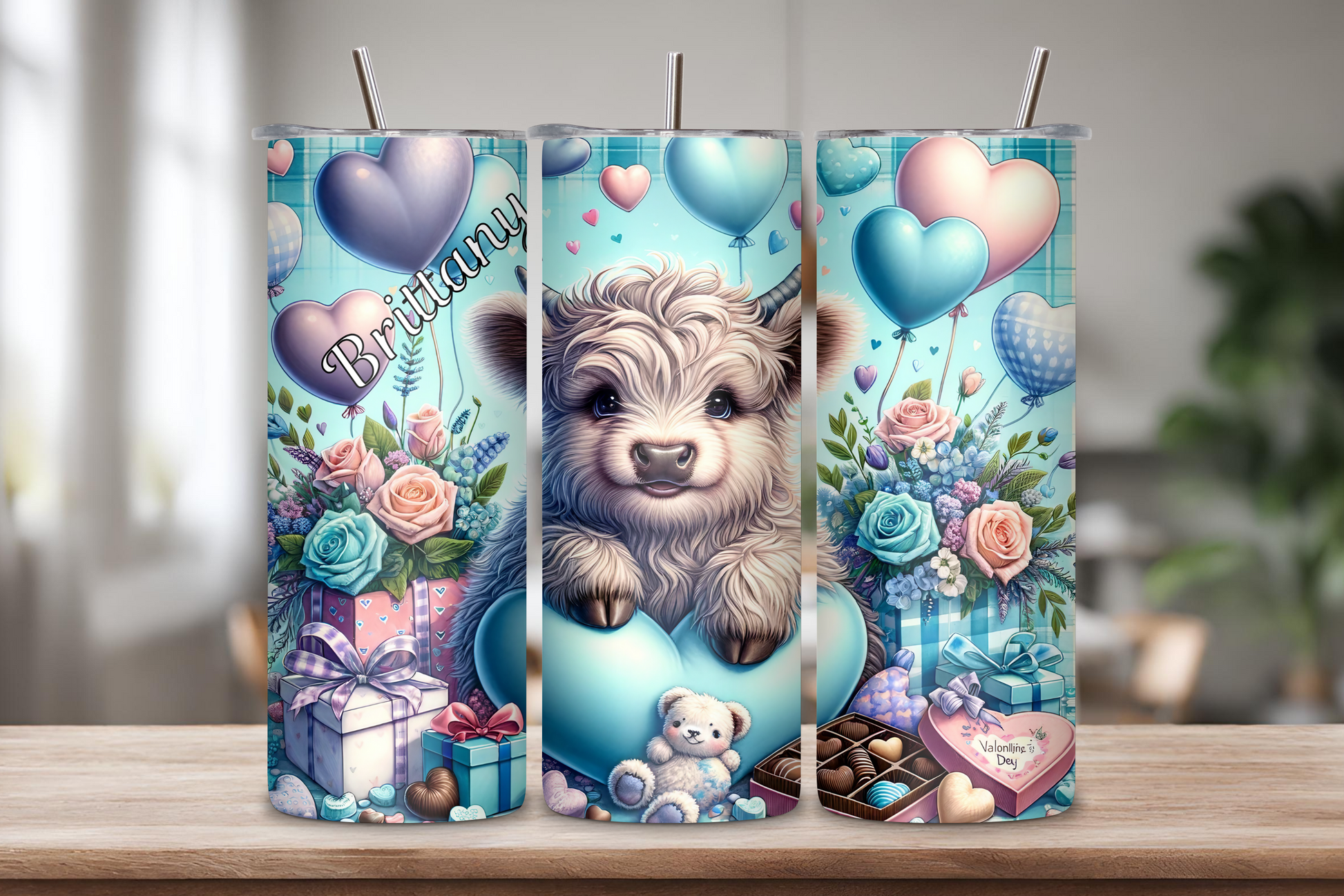 Personalized tumbler featuring a Highland cow with heart balloons, flowers, chocolates, and gifts, customized with a name up to 12 characters